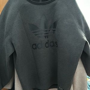Adidas sweatshirt is new without tags. The sleeves are a little bubble sleeves